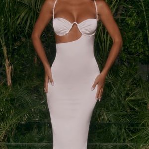 ALL NIGHT LONG 
ASYMMETRIC CUT OUT MIDI DRESS IN IVORY from Oh Polly